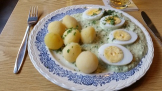 Traditional dish of boiled potatoes, hard boiled eggs with green sauce, Baseler Eck Win bier .